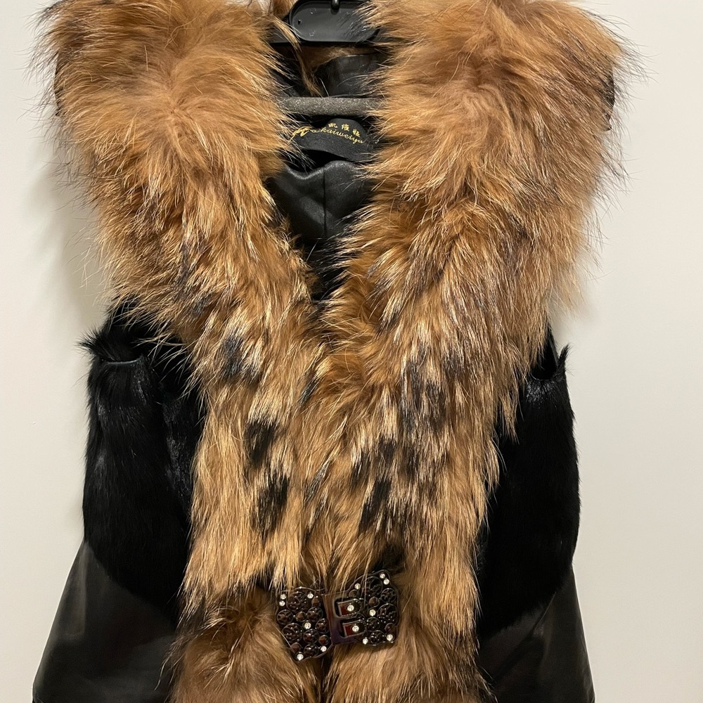fur and leather vest. Like new